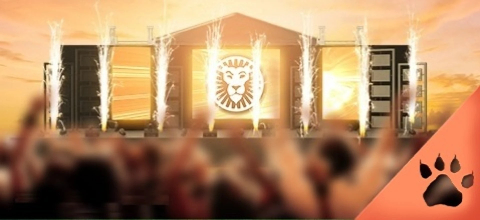 Publikum foran scene med lys og fyrværkeri, der viser leovegas logo i midten