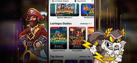 Man holding a book next to a slot machine with cartoon alien characters.