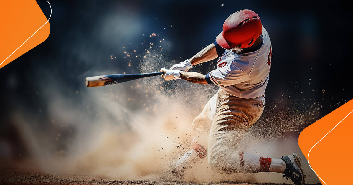 baseball player taking a swing at the ball whilst dragging feet through the sand