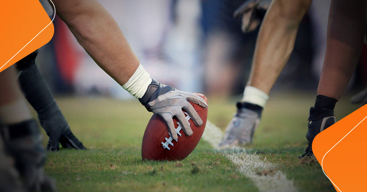 football placed on the pitch ready to be snapped
