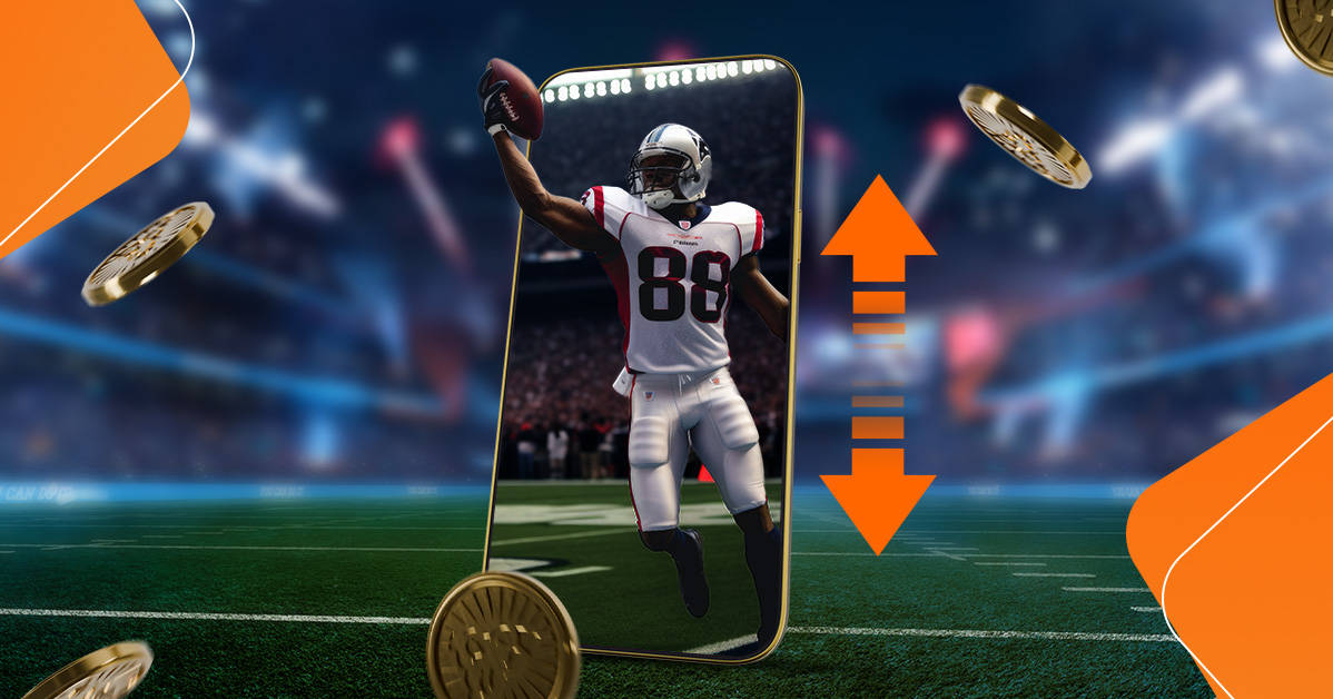 mobile phone with football player reaching out for ball